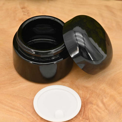 Weithalsdosen aus Violettglas